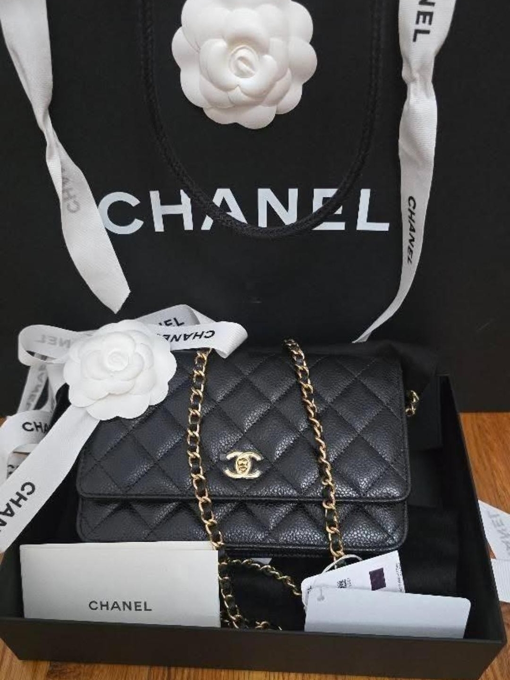 CHANEL Black Quilted Caviar Leather Flap Lock Shoulder Bag with Gold  Chain 2026